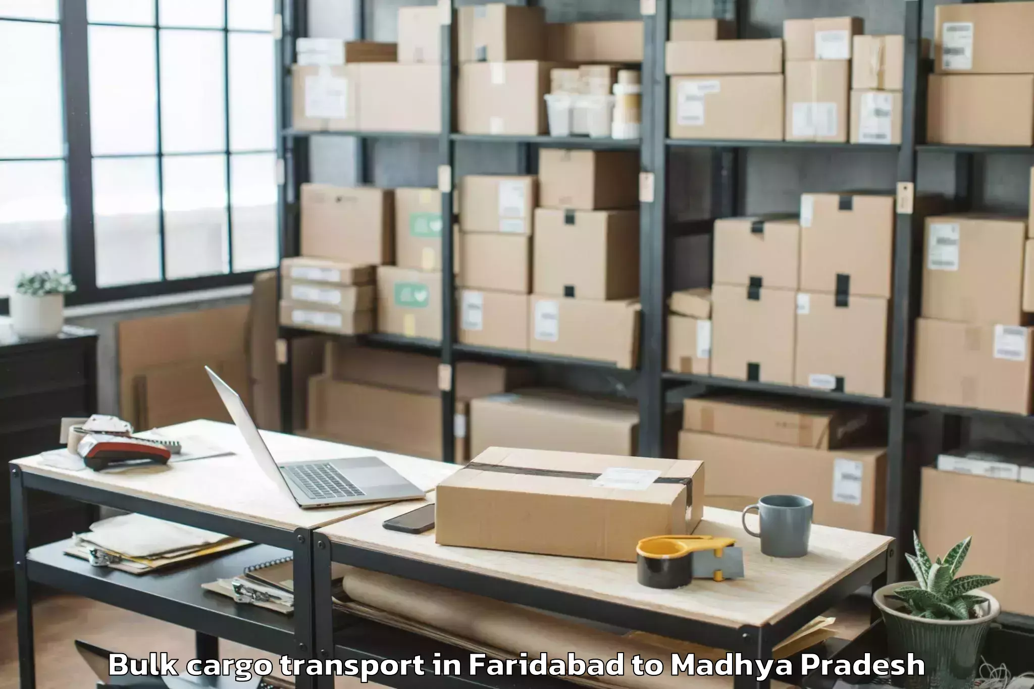 Book Faridabad to Mahidpur Bulk Cargo Transport